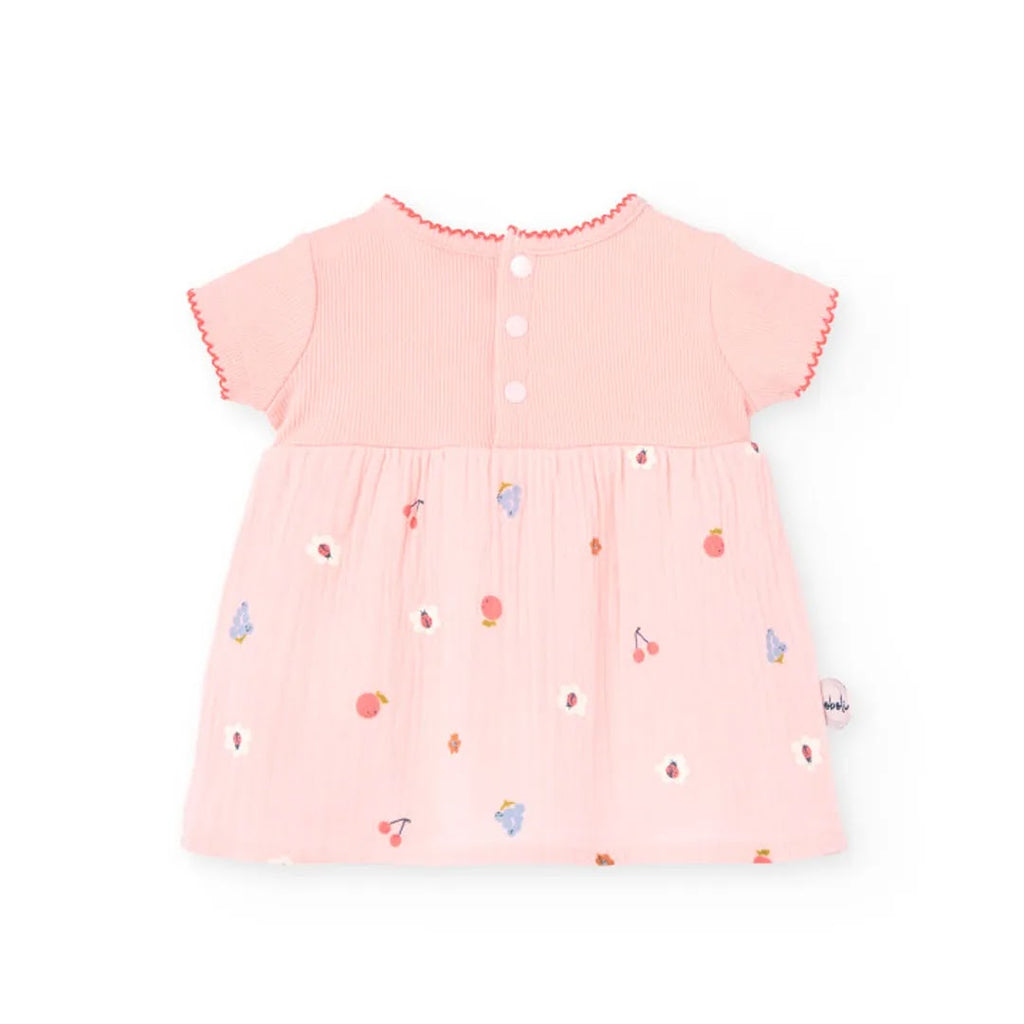 Vestito stampato con copri pannolino in tinta rosa