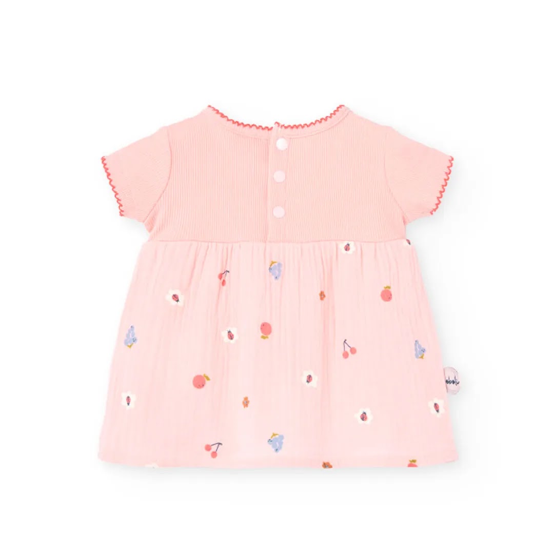 Vestito stampato con copri pannolino in tinta rosa