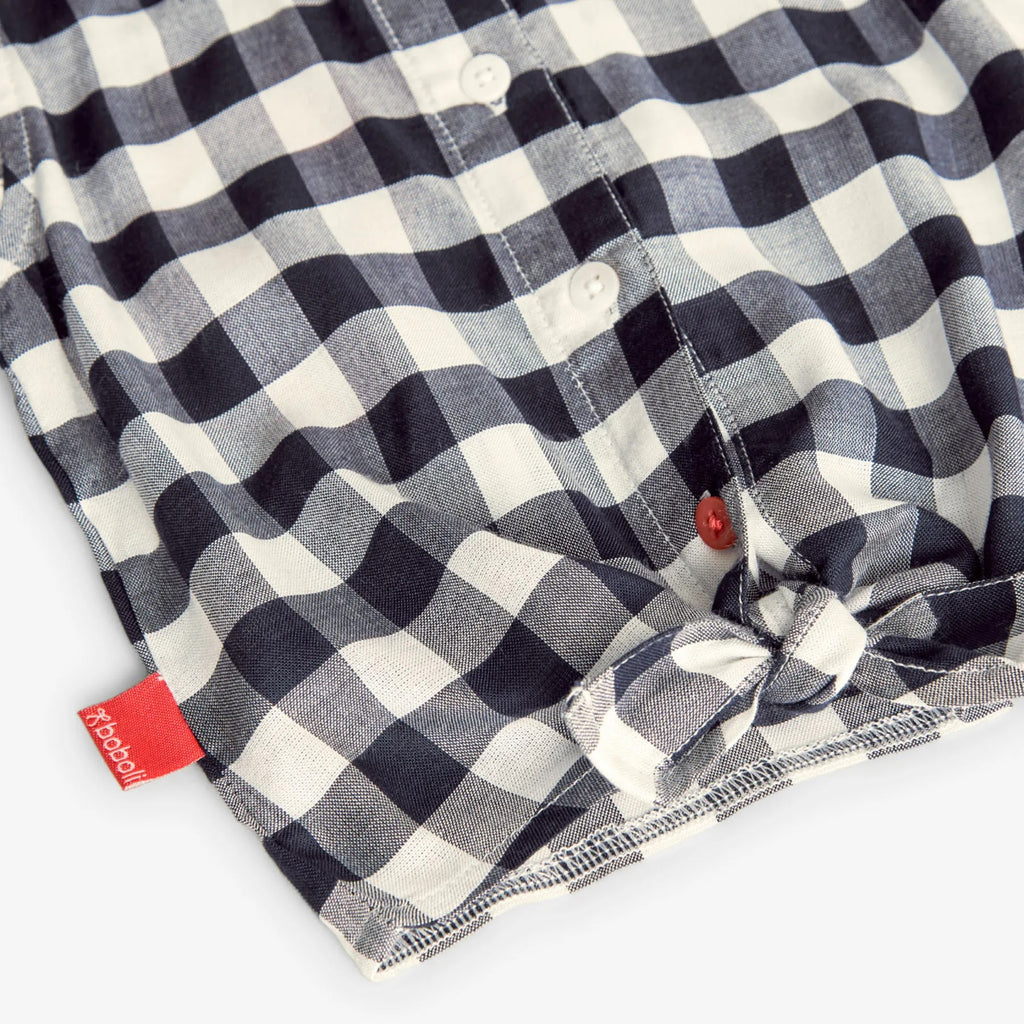 Camicia a quadri giromanica e nodo quadri