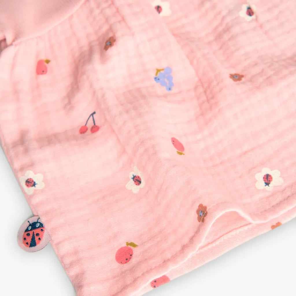 Vestito stampato con copri pannolino in tinta rosa