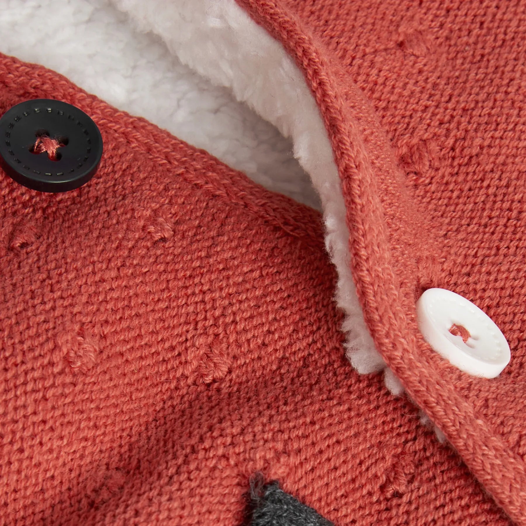Cardigan ponpon cappuccio