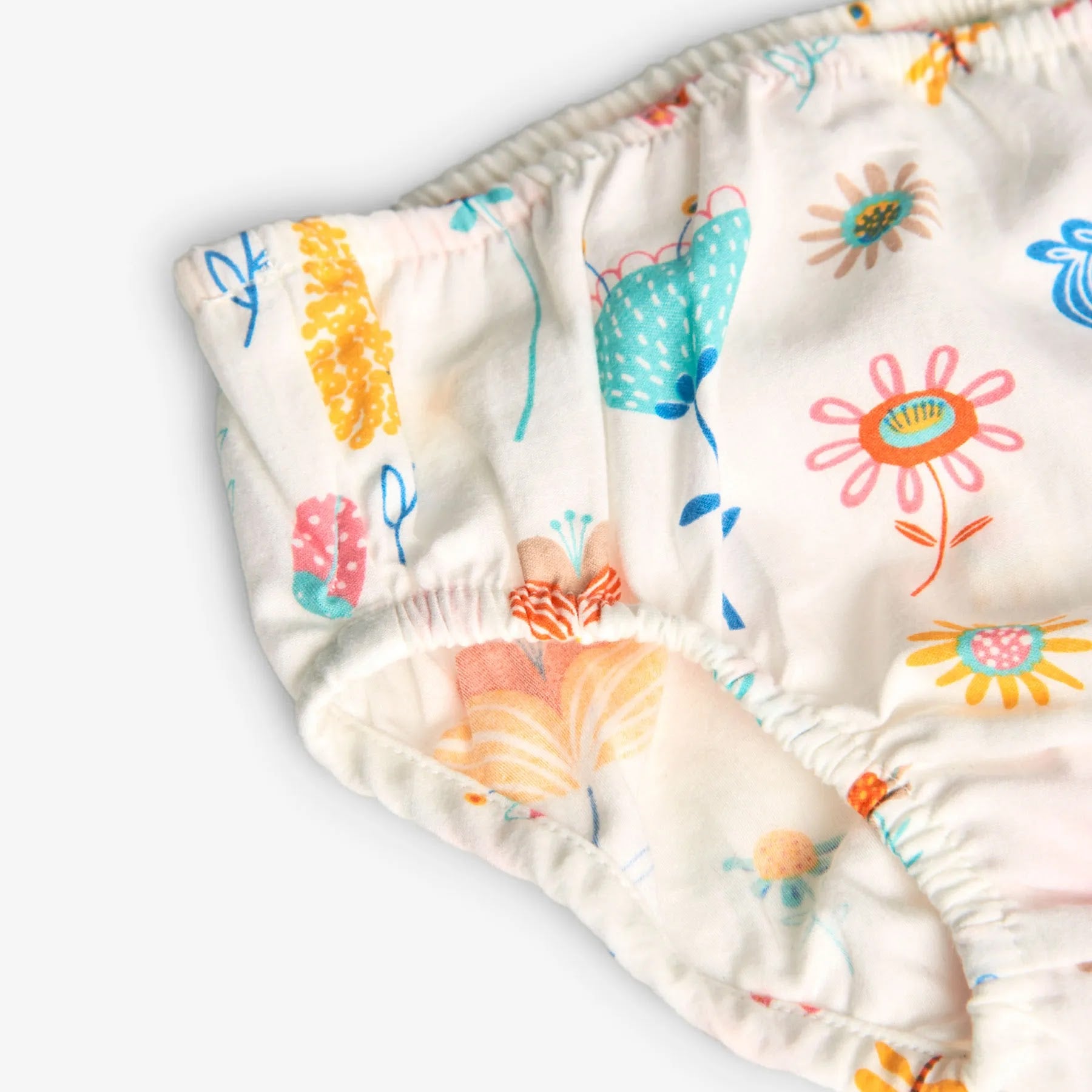 Vestito bianco con dettagli turchesi