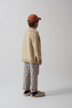 Pantalone chino con stampa mela topo