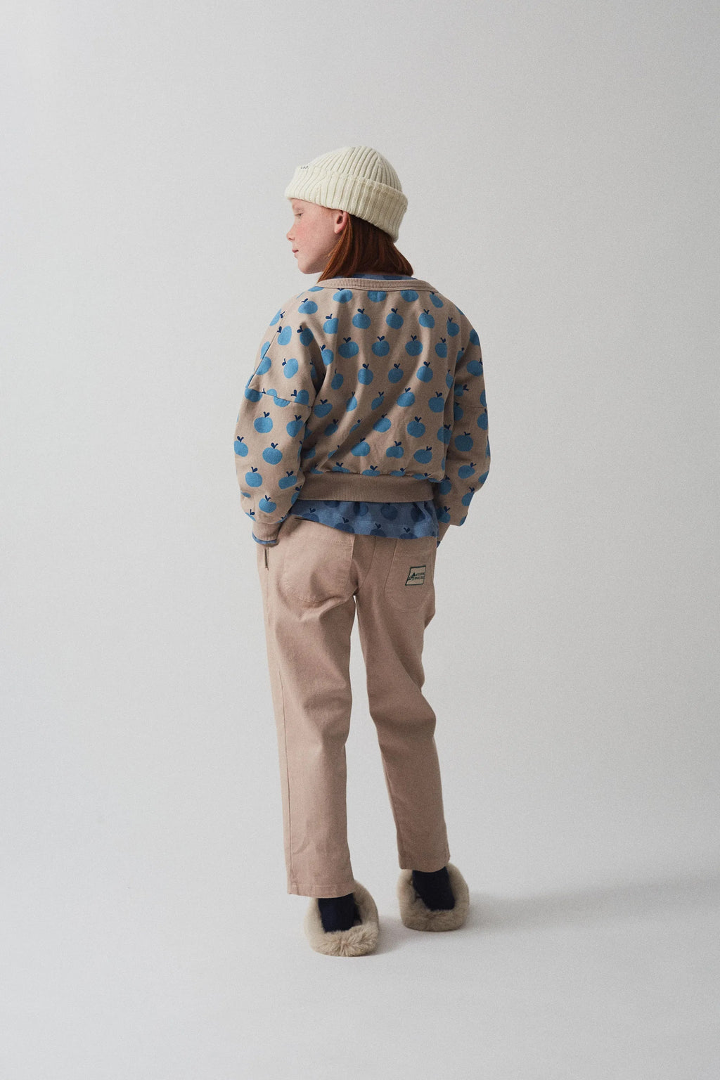Cardigan morbido con mele all over topo