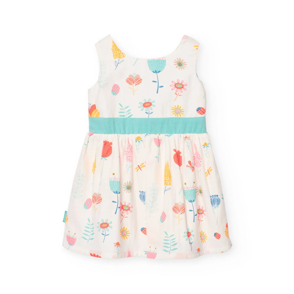 Vestito bianco con dettagli turchesi