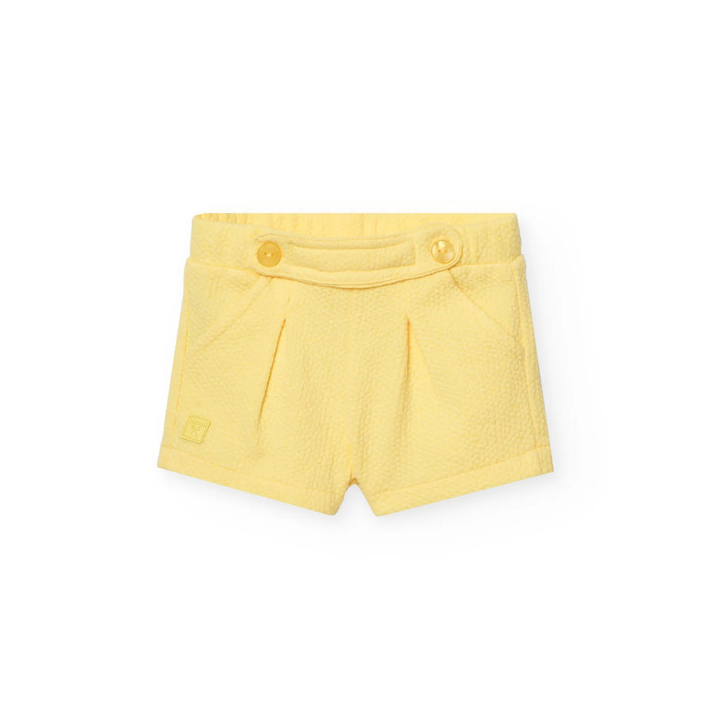 Shorts giallo con bottoni