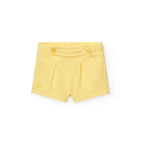 Shorts giallo con bottoni