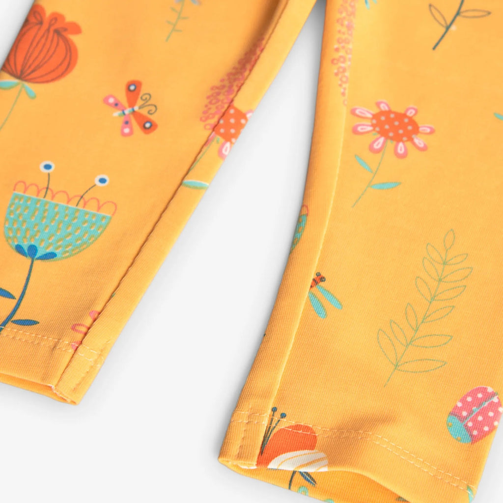 Leggings con fiori ed insetti stampati