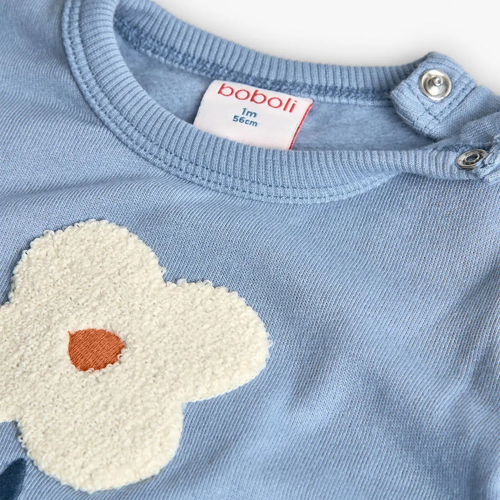 Completo maglia e pantalone floreale