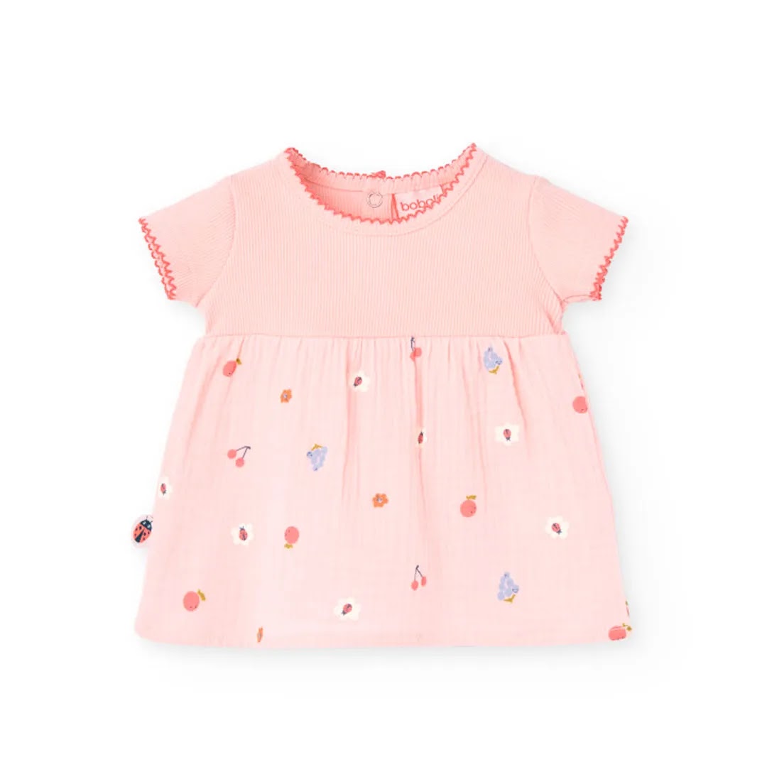 Vestito stampato con copri pannolino in tinta rosa