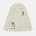 Camicia ricamata con cavallo seduto sabbia