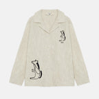 Camicia ricamata con cavallo seduto sabbia