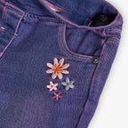 Pantaloni jeans a zampa fiori applicati viola