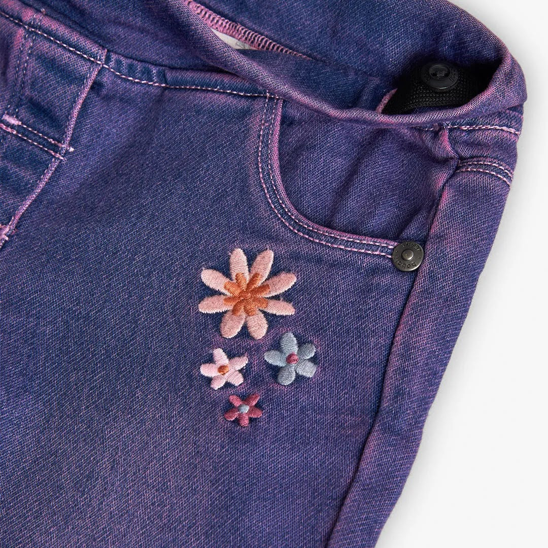 Pantaloni jeans a zampa fiori applicati viola