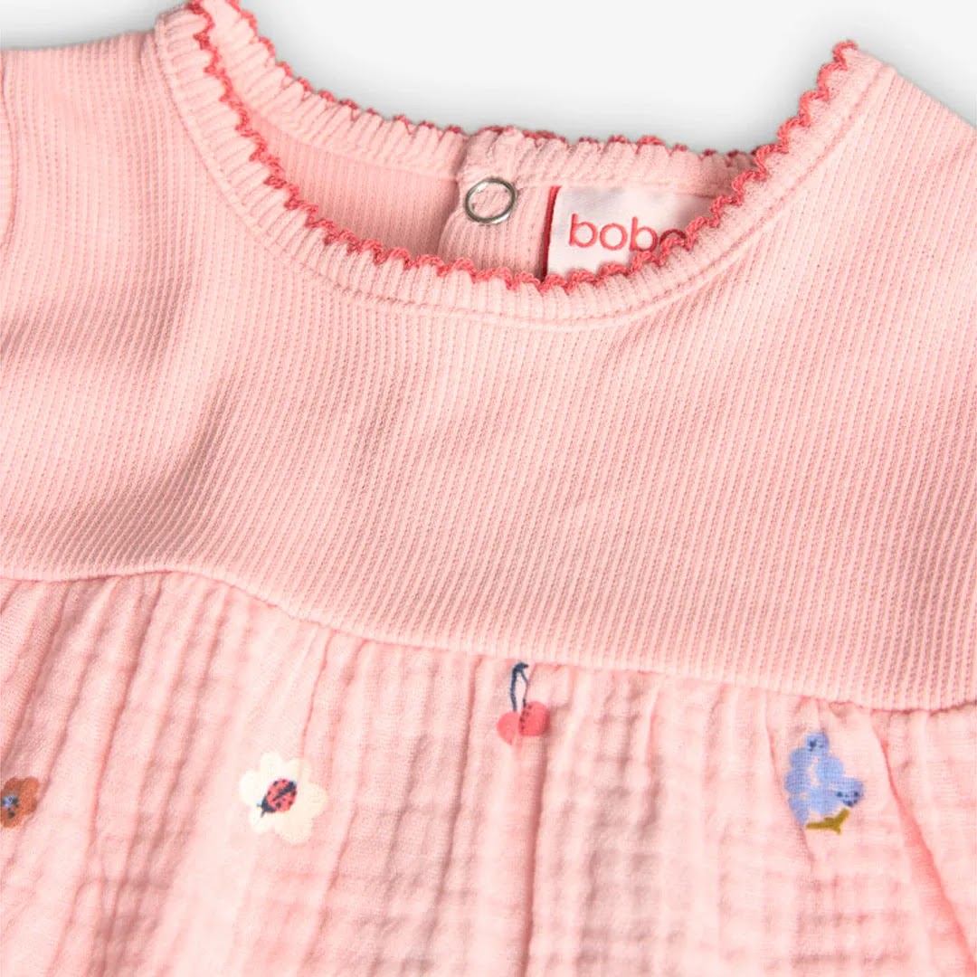 Vestito stampato con copri pannolino in tinta rosa