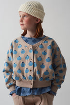 Cardigan morbido con mele all over topo