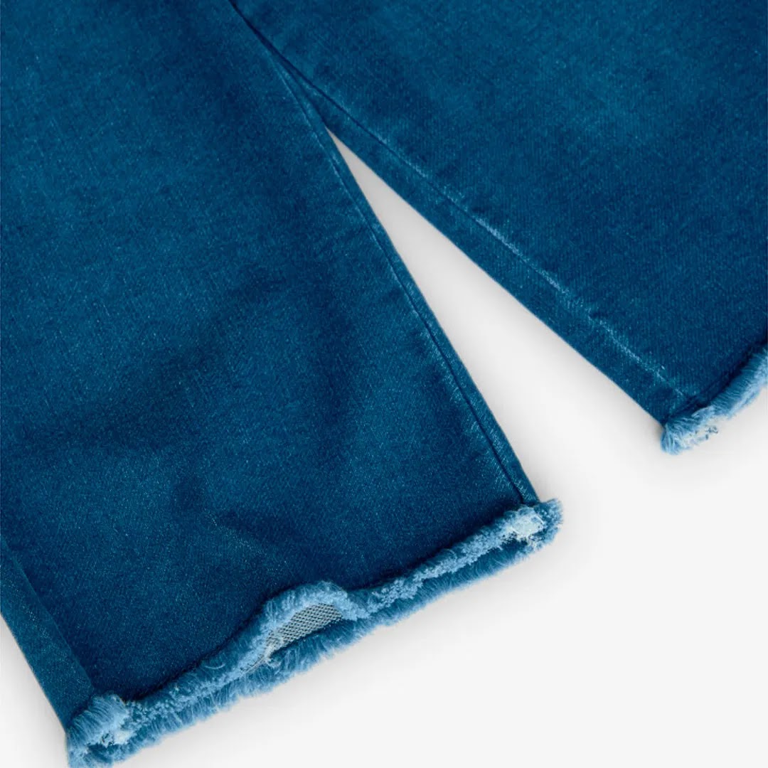 Jeans gamba dritta con applicazioni floreali