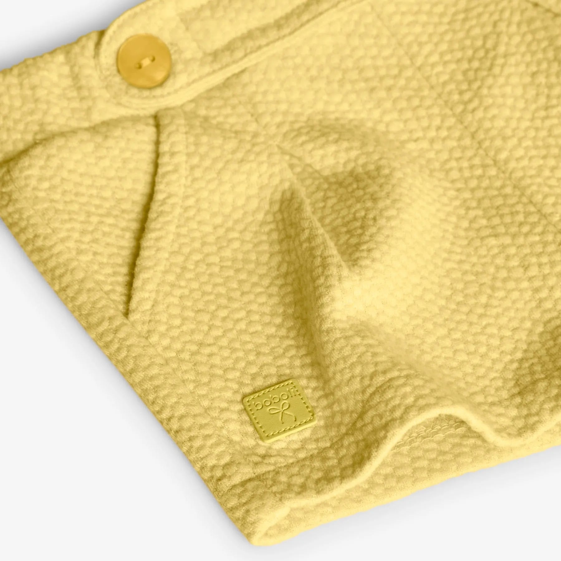 Shorts giallo con bottoni
