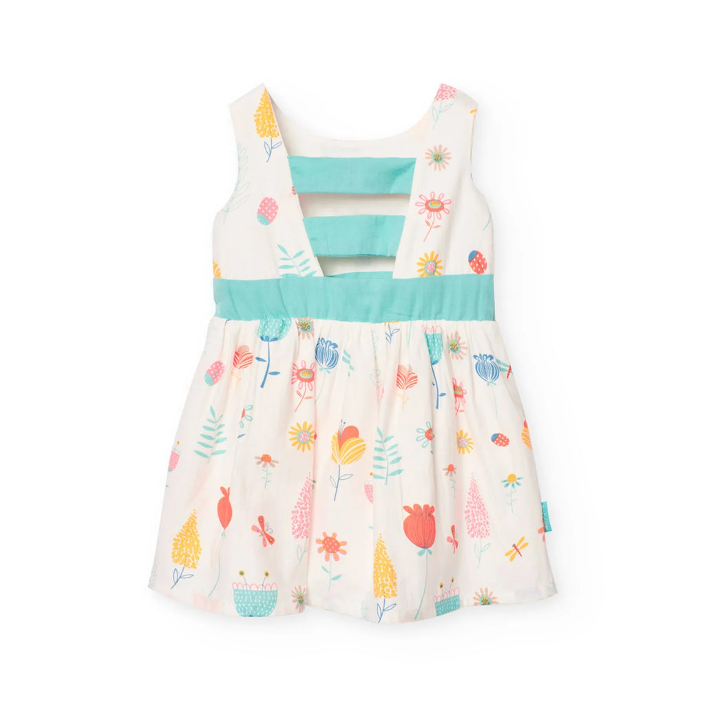 Vestito bianco con dettagli turchesi