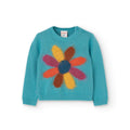 Maglione con fiore fondo turchese