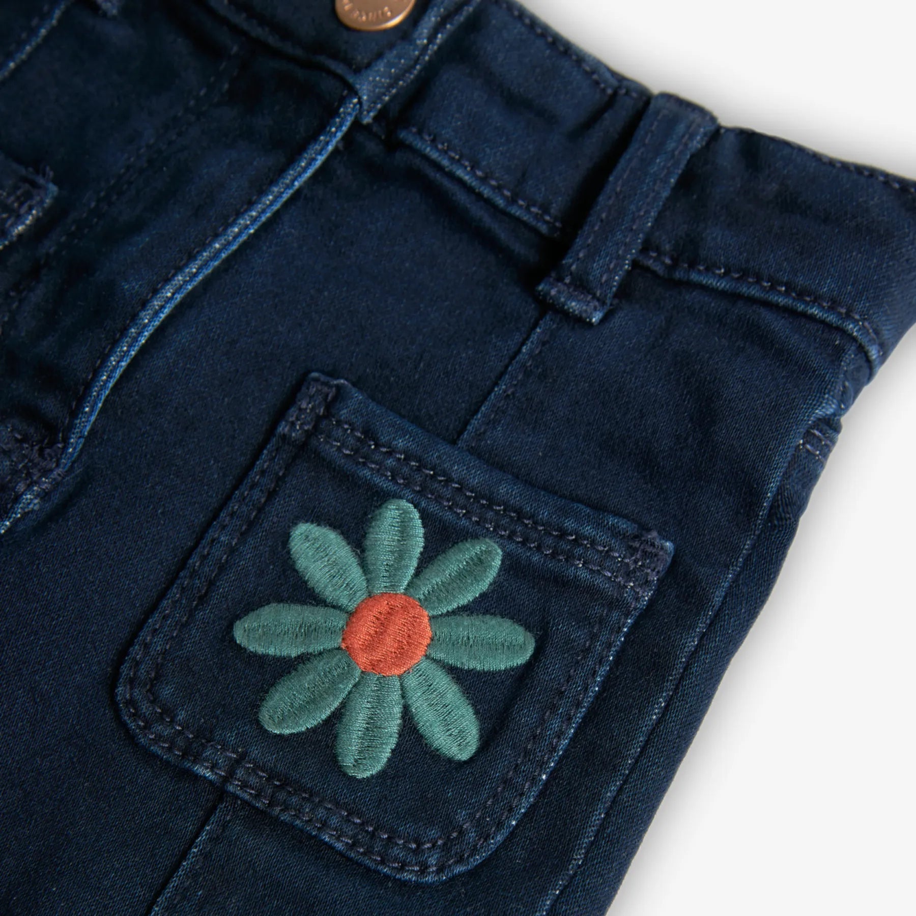 Pantaloni jeans linea dritta fiori applicati
