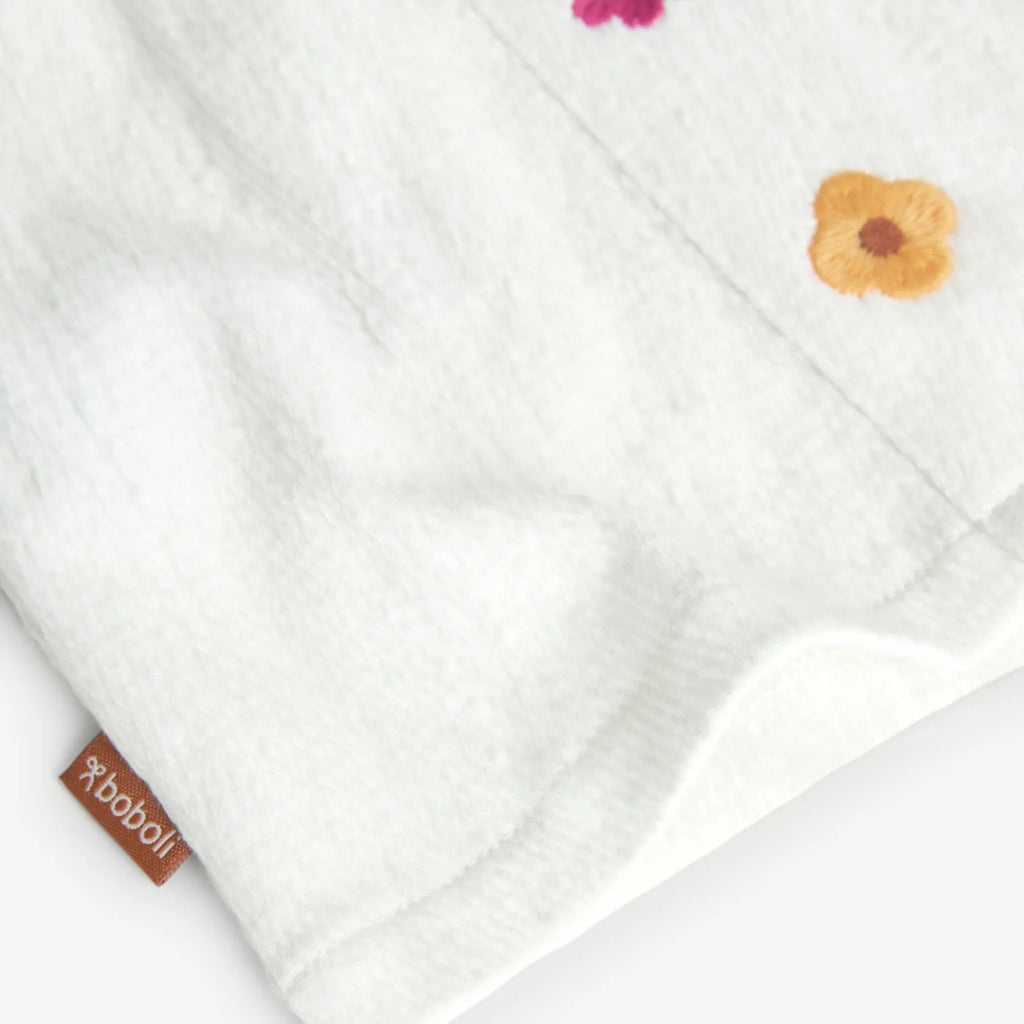 Maglietta jersey con fiori applicati