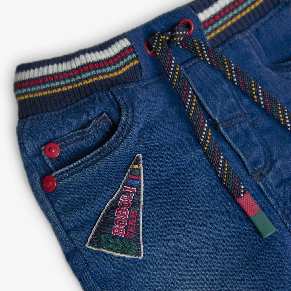 Pantaloni jeans con elastico colorato