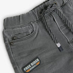 Pantaloni jeans con applicazioni bimbo grigio
