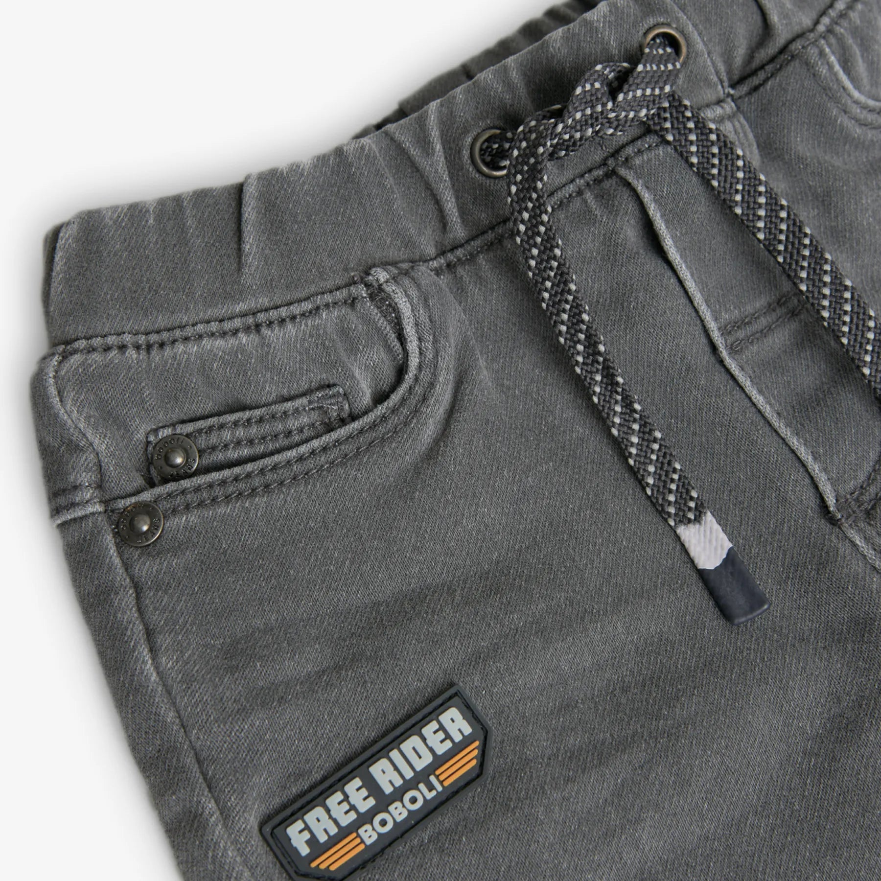 Pantaloni jeans con applicazioni bimbo grigio