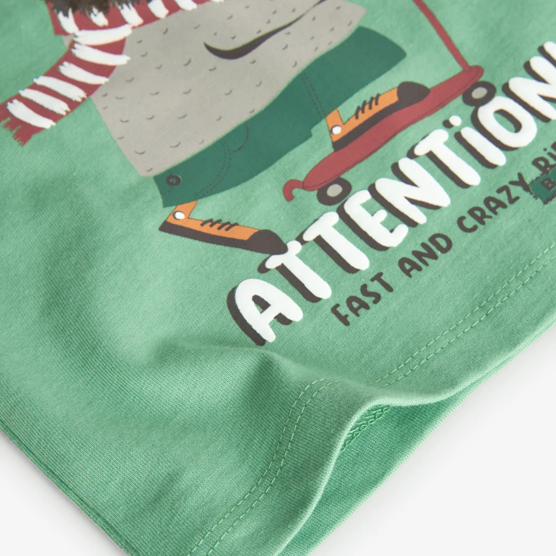 T-shirt manica lunga verde foglia stampa orso monopattino