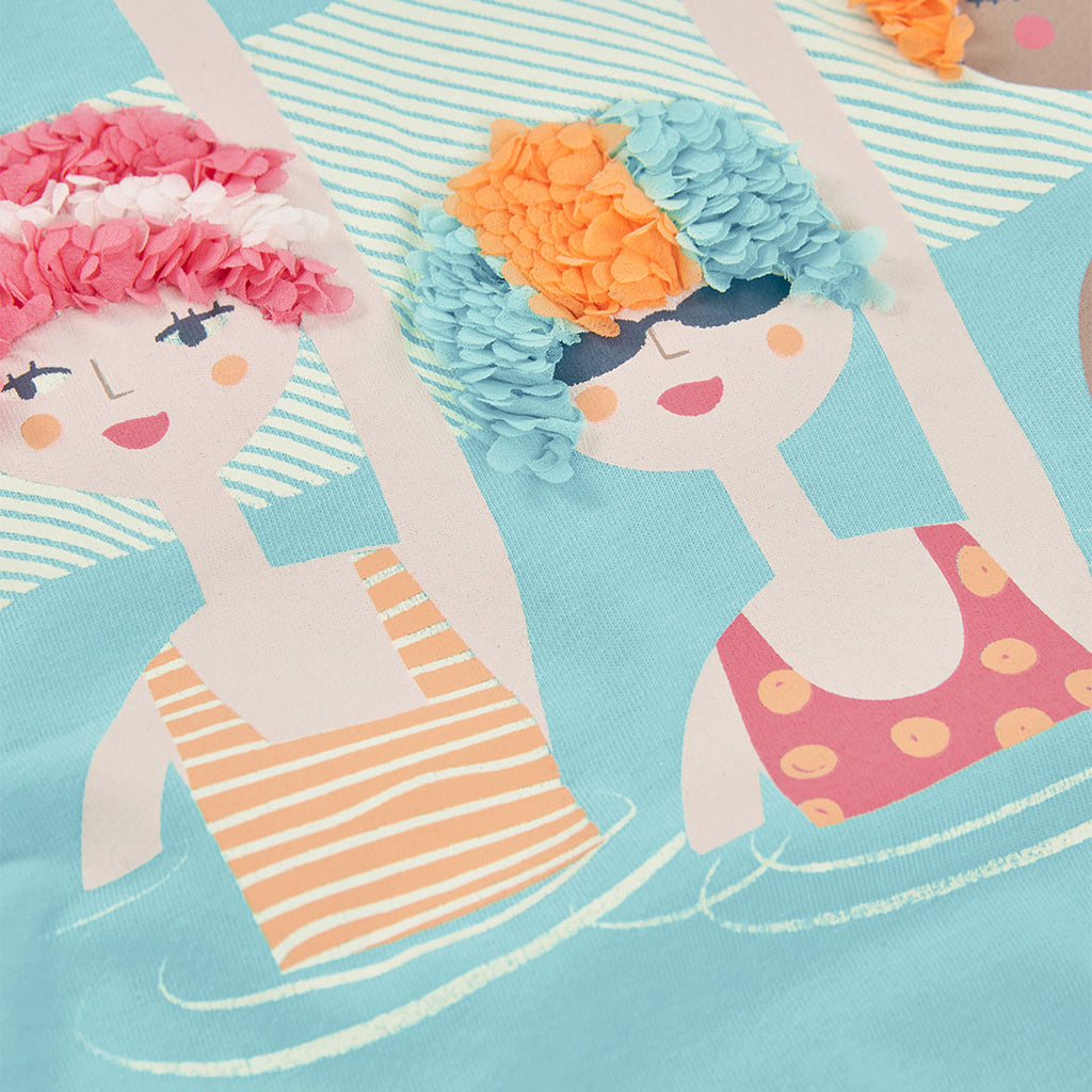 T-shirt giromanica con pon pon