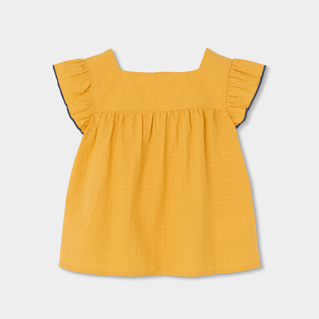 Blusa scollo quadrato volant sul giromanica