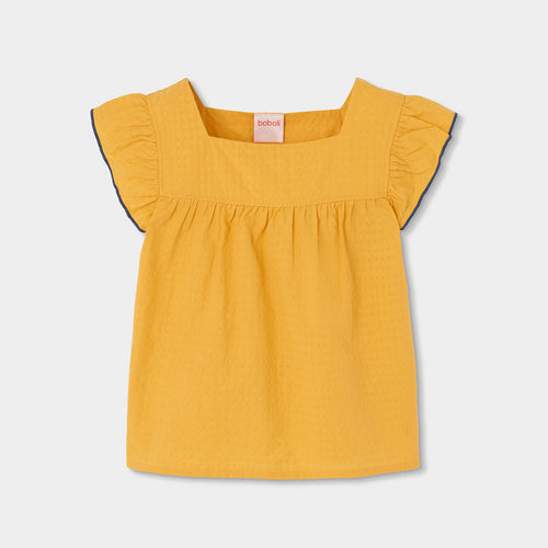 Blusa scollo quadrato volant sul giromanica