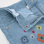 Short jeans con fiori ricamati