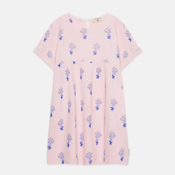 Abito all over con bouquet e tasche