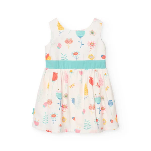 Vestito bianco con dettagli turchesi